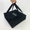 pizza bag being held by hand