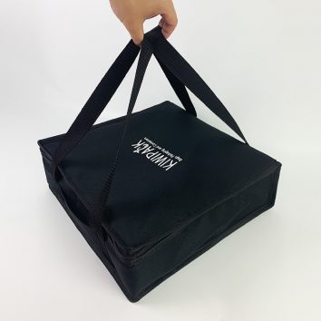 pizza bag being held by hand